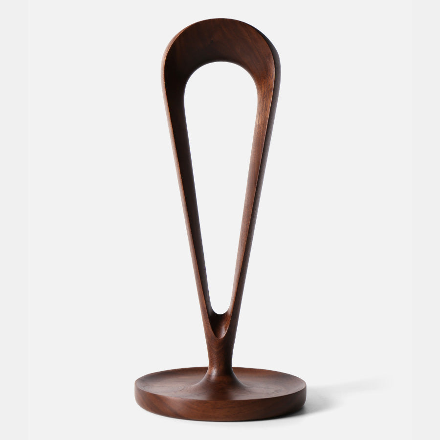 Natural wood headphone stand with smooth walnut grain finish