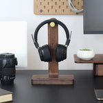 Natural wood headphone stand with smooth walnut grain finish