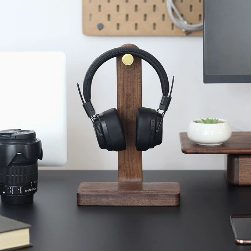Natural wood headphone stand with smooth walnut grain finish