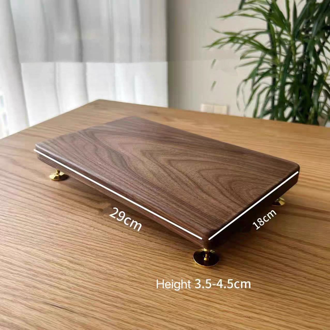 Natural wood speaker riser with smooth walnut grain finish