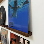Wooden vinyl record shelf for showcasing favorite albums
