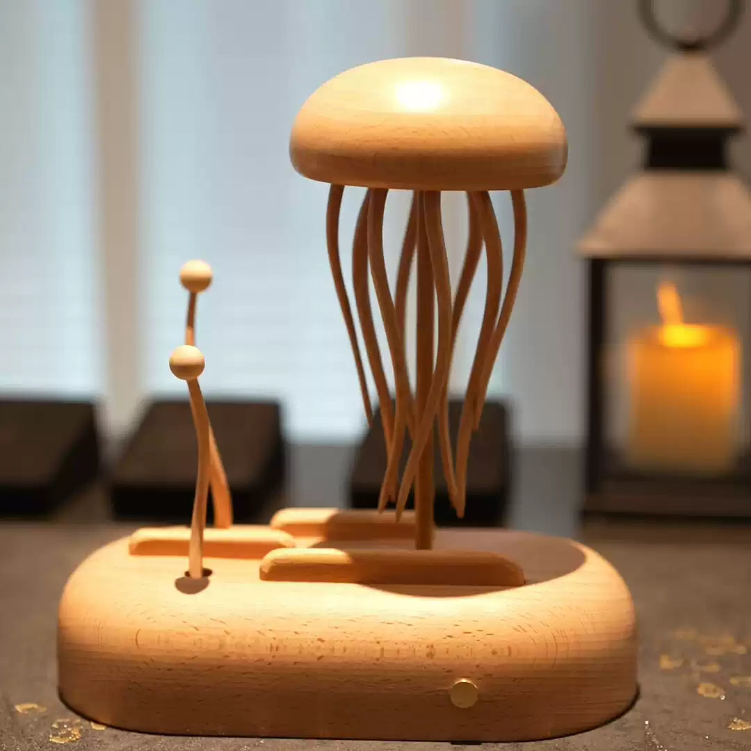 Wooden jellyfish-shaped lamp on a wooden base with a blurred background