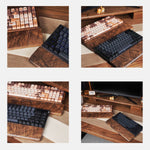 Four-panel product showcase of a wooden keyboard tray with integrated wrist rests and keyboard slots, shown in different color options (black, rose gold, and copper/bronze) on a desk setup. Chinese text labels describe features like solid wood construction, rounded corners, smooth surfaces, and unique grain patterns.